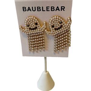 Adorable Seed Bead Ghost Earrings. The bottom half moves.